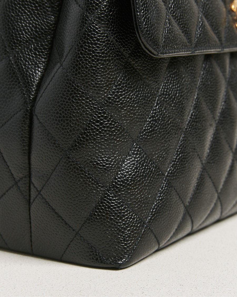 Heren | Gifts for Her | Chanel Pre-Owned | Kelly Top Handle Bag Black Caviar