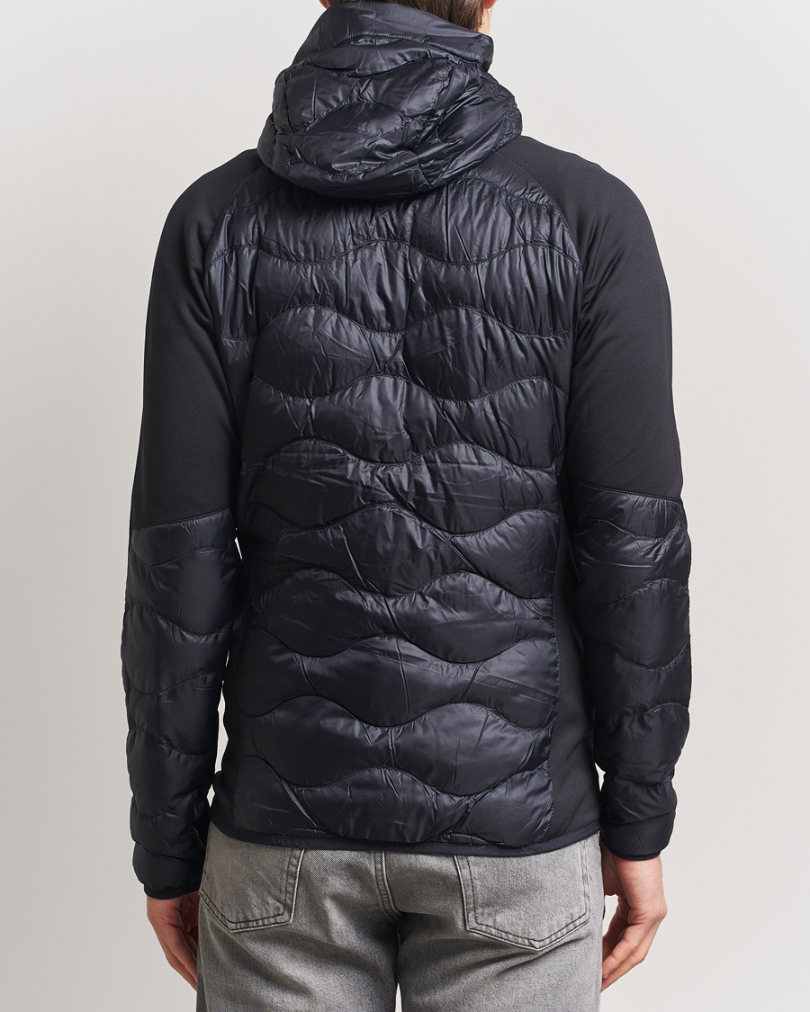 Heren | Jassen | Peak Performance | Helium Down Hooded Hybrid Jacket Black