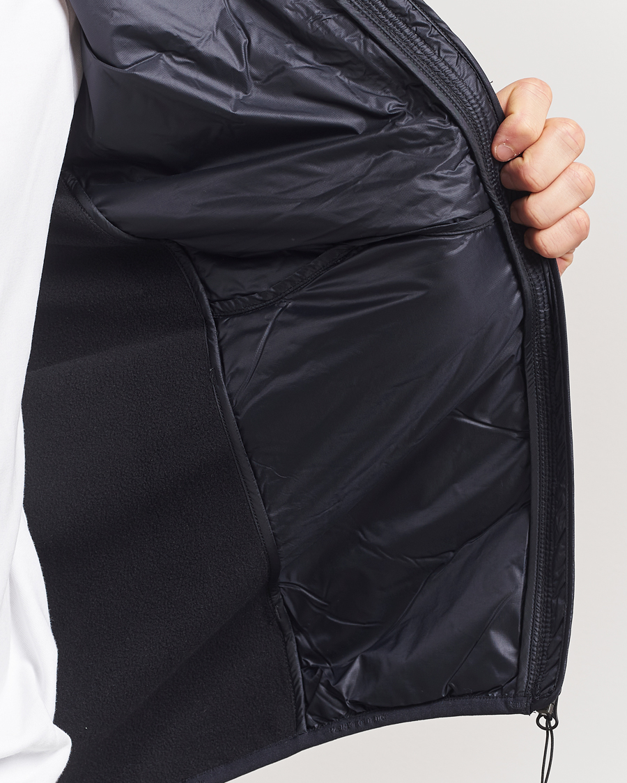 Heren | Jassen | Peak Performance | Helium Down Hooded Hybrid Jacket Black