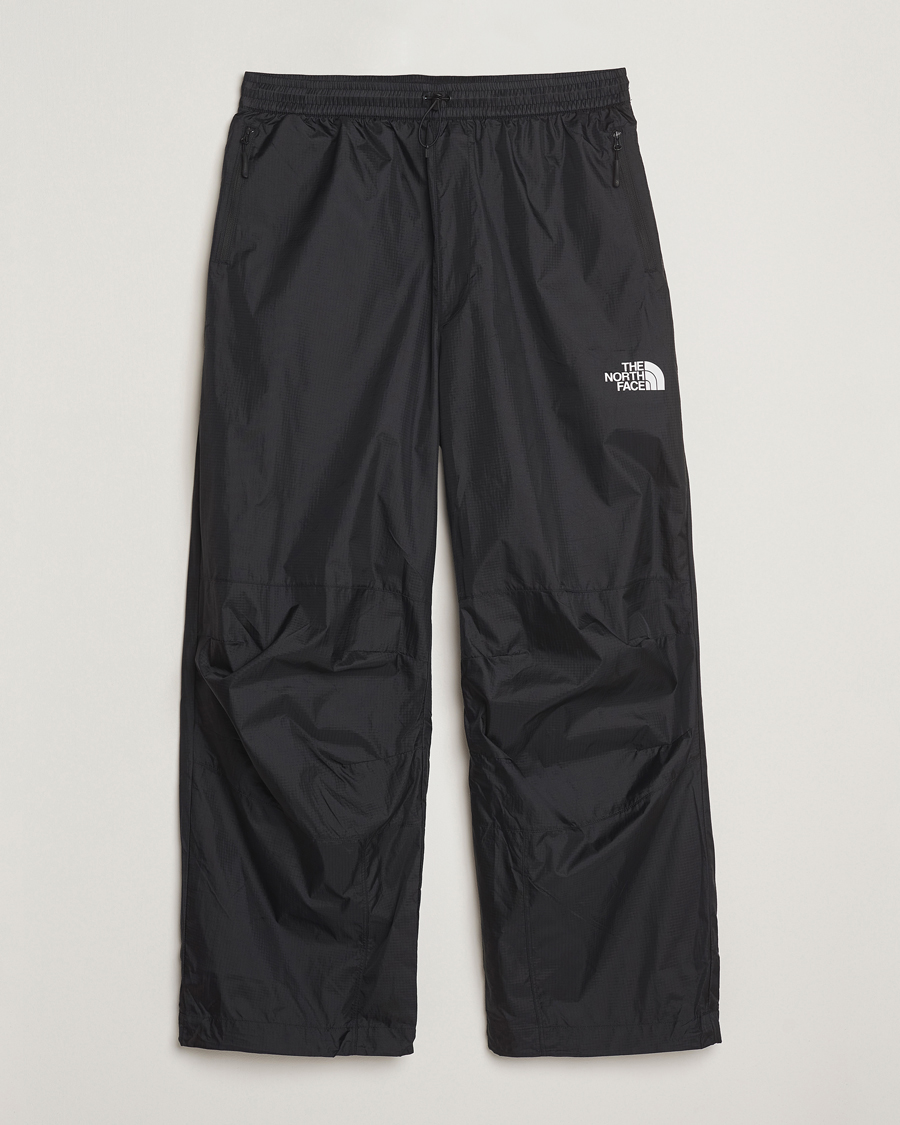 Heren | Broeken | The North Face | NSE Wind Track Pants Black
