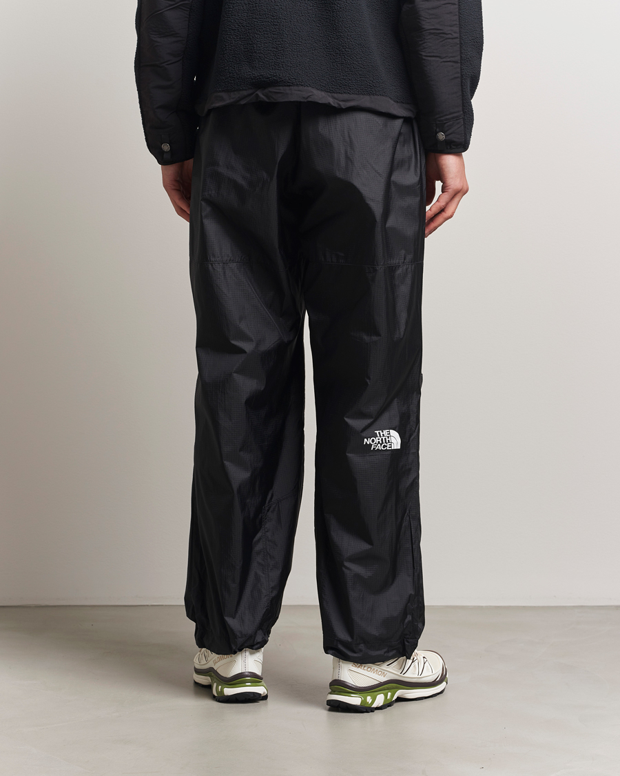 Heren | Broeken | The North Face | NSE Wind Track Pants Black