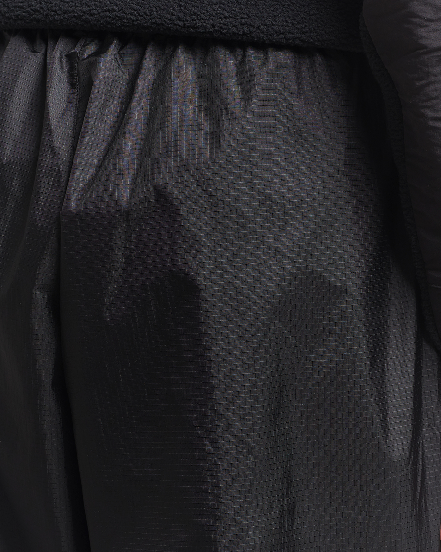 Heren | Broeken | The North Face | NSE Wind Track Pants Black