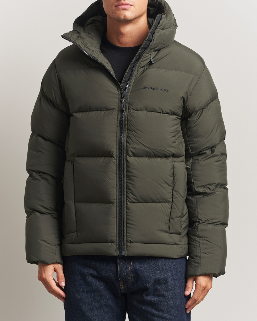 Heren | Jassen | Peak Performance | Rivel Down Hooded Jacket Olive Extreme