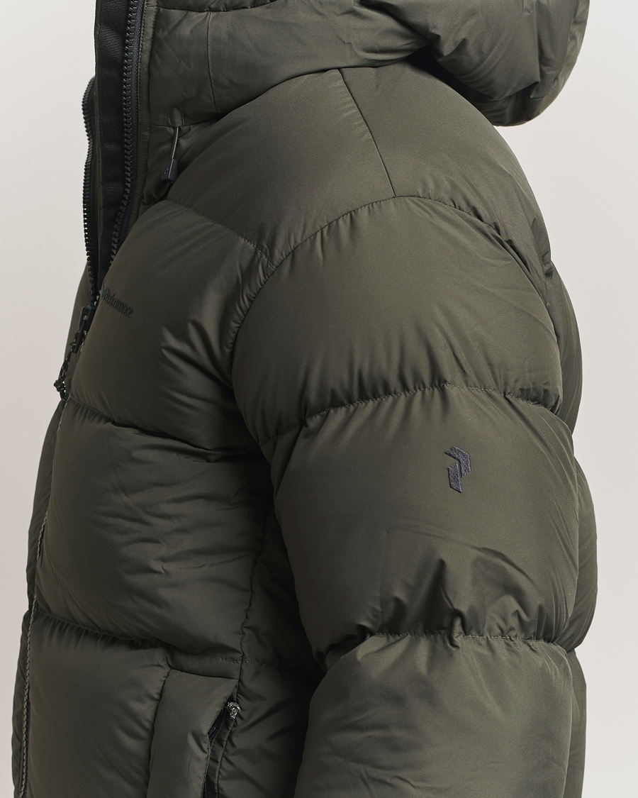 Heren | Jassen | Peak Performance | Rivel Down Hooded Jacket Olive Extreme