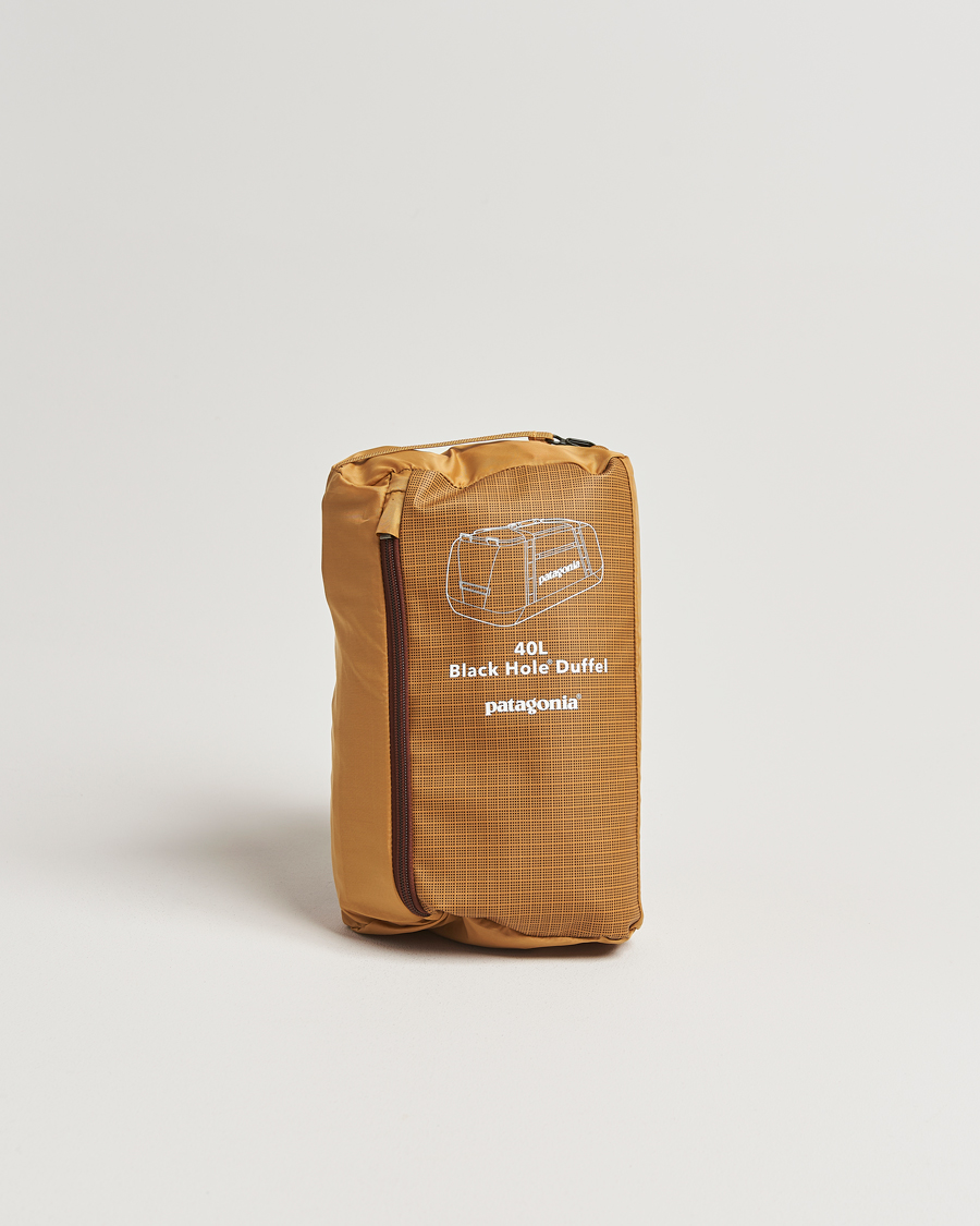 Heren | Tassen | Patagonia | Black Hole Duffel 40L Talon Gold