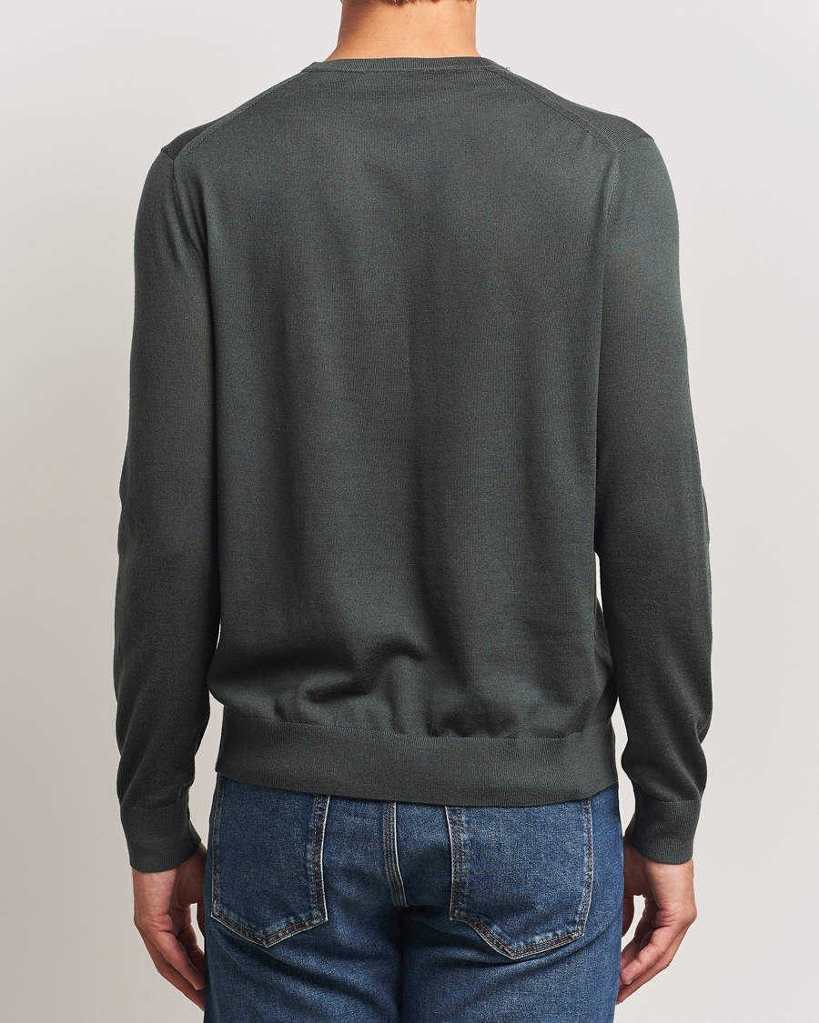 Heren | Truien | Tiger of Sweden | Connor Extra Fine Merino Crew Neck Pullover Midnight Green