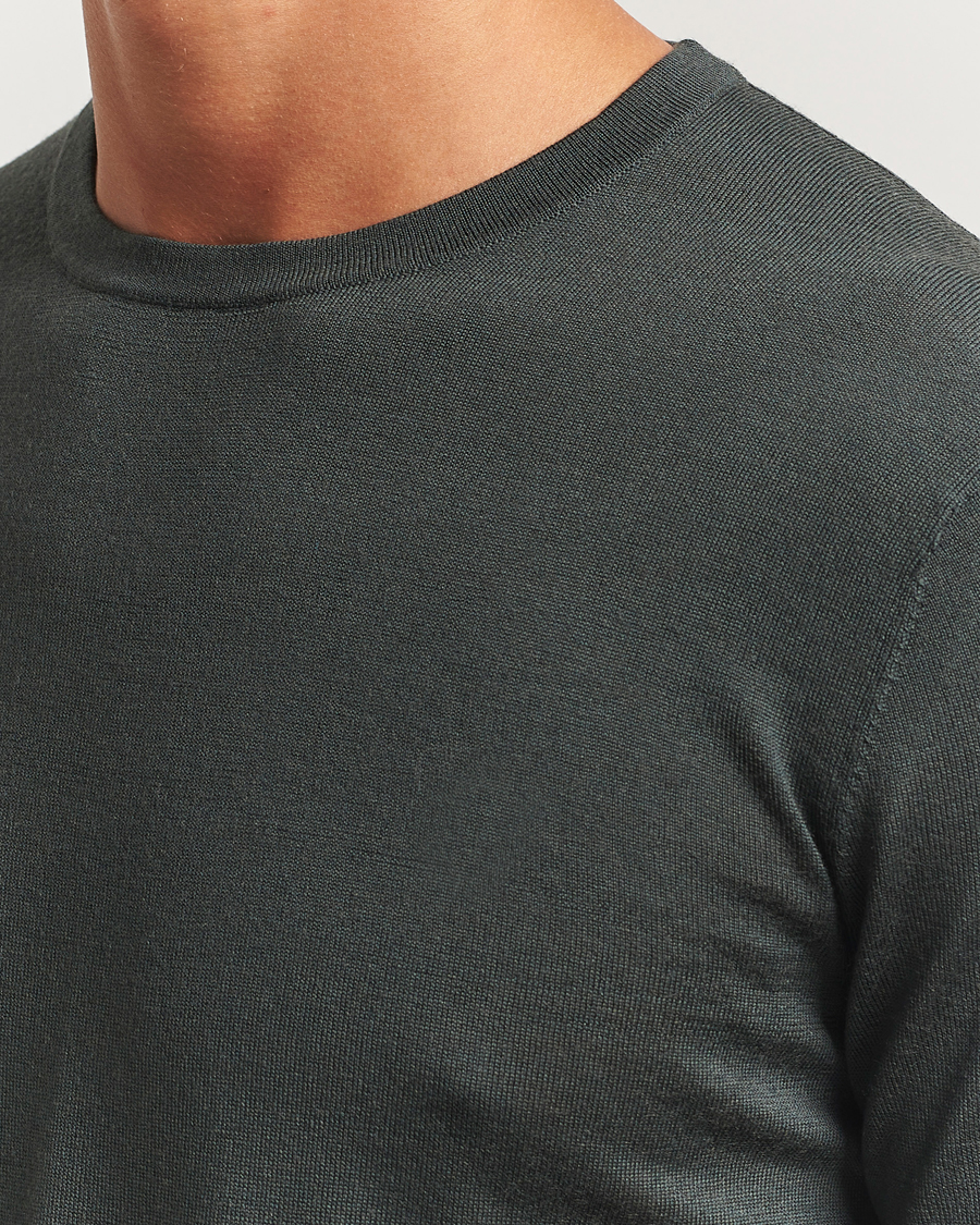 Heren | Truien | Tiger of Sweden | Connor Extra Fine Merino Crew Neck Pullover Midnight Green