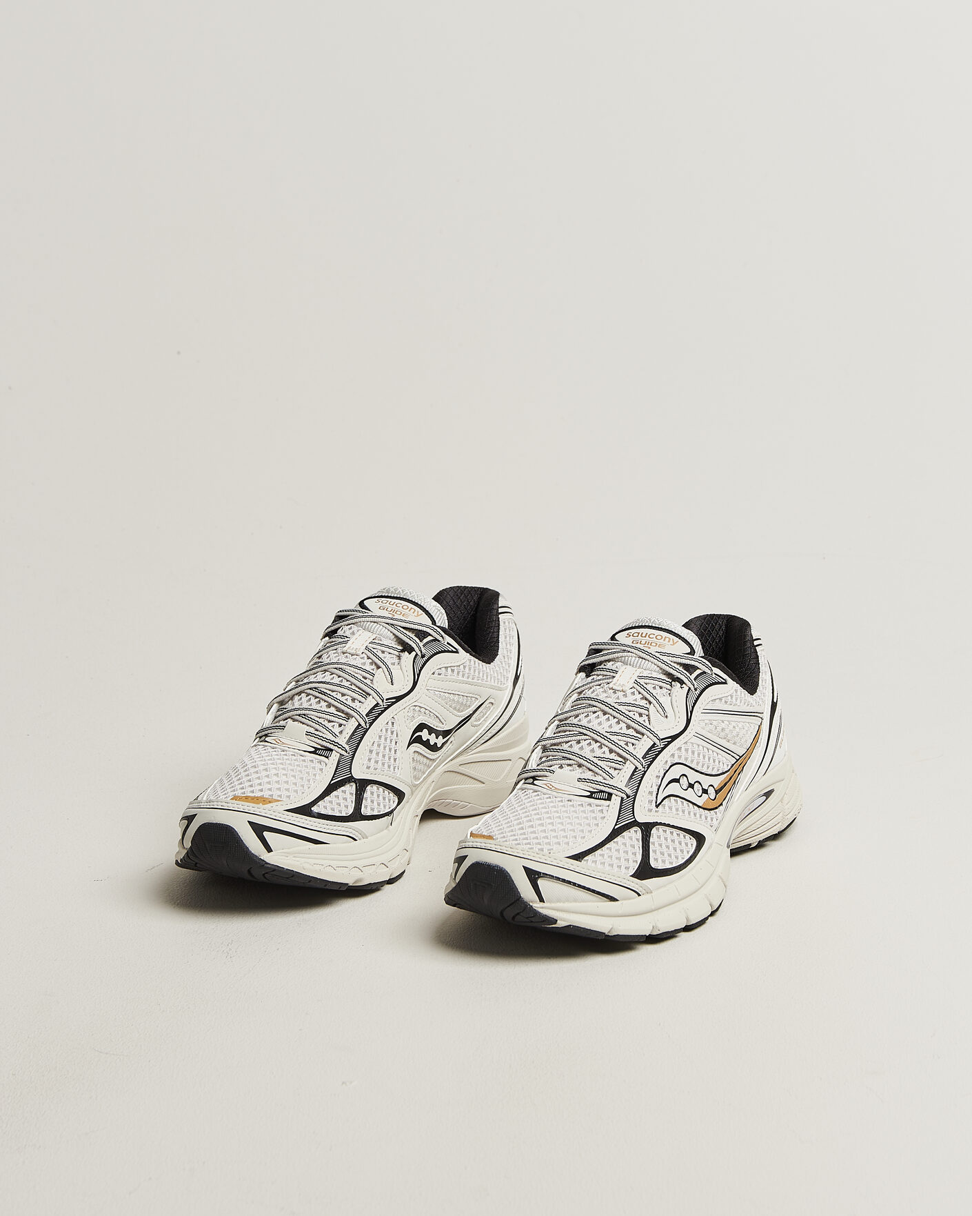 Heren | Sneakers | Saucony | Guide 7 Running Sneaker Onyx/Gold