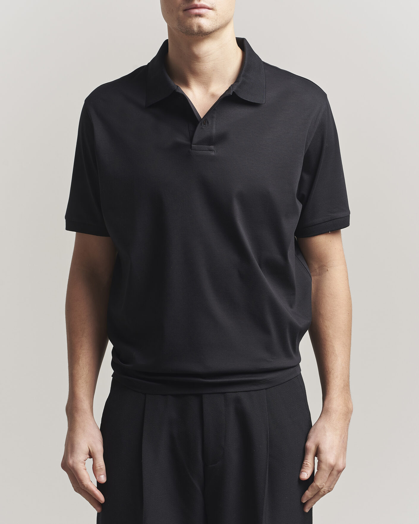Heren | Polo's | Filippa K | Technical Cotton Polo Black