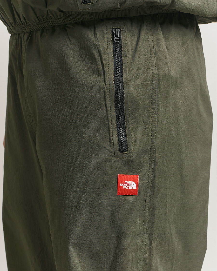 Heren | Broeken | The North Face | Red Box Packable Wind Pants New Taupe Green
