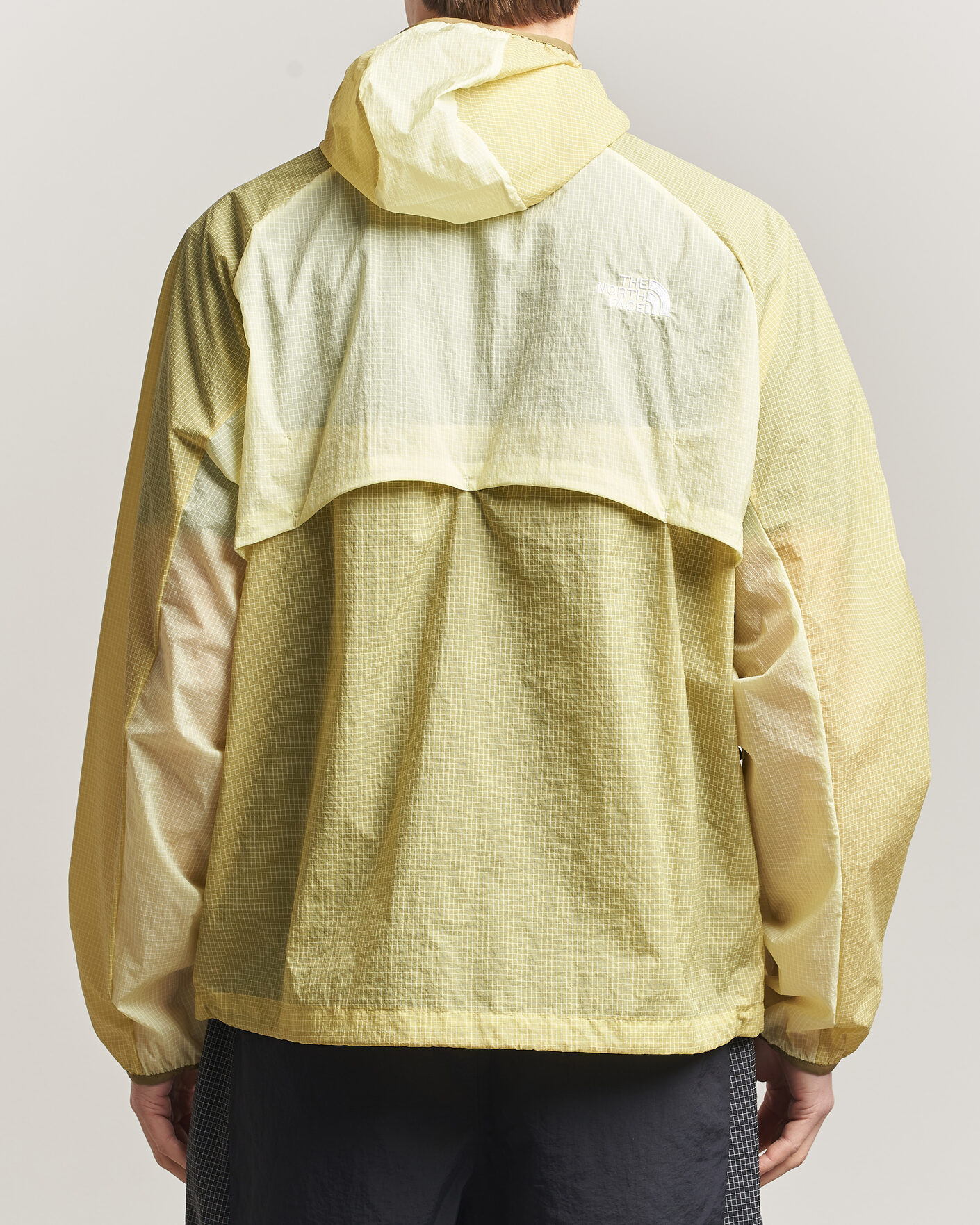 Heren | Jassen | The North Face | NSE Wind Jacket Lemon Mist