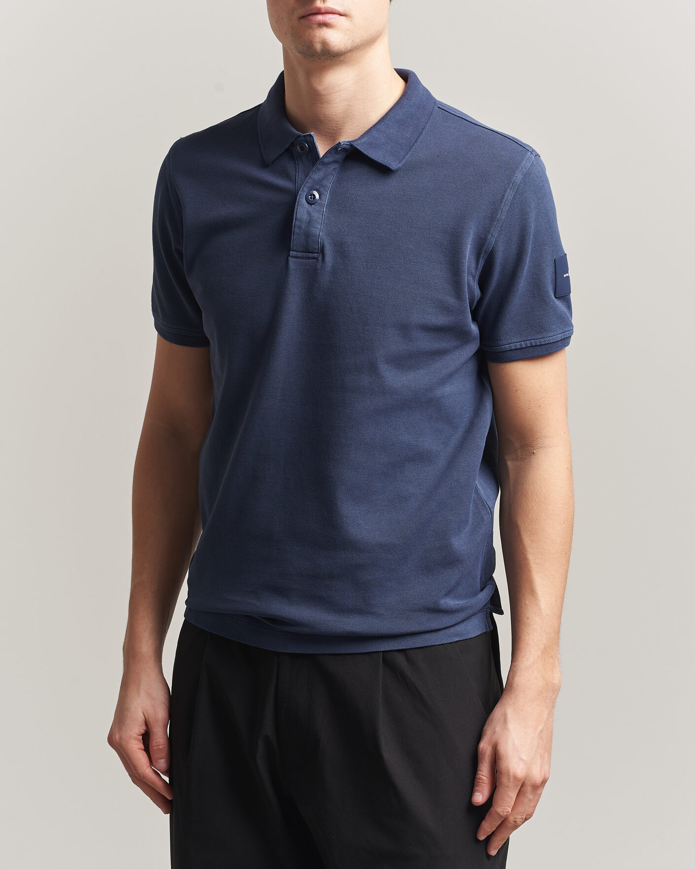 Heren | Polo's | Sail Racing | Wind Pigment Dyed Polo Dark Navy