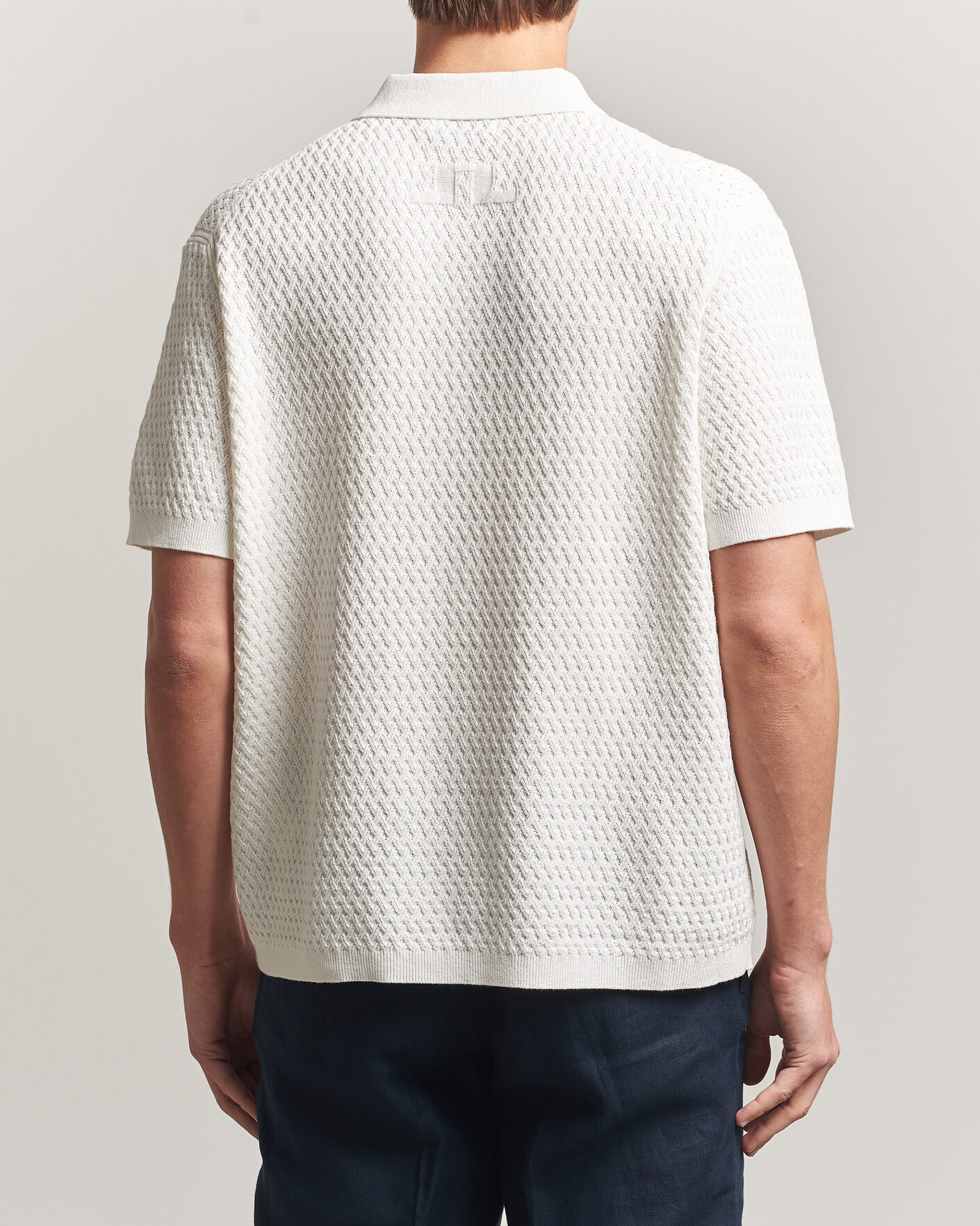 Heren | Polo's | J.Lindeberg | Jacques Structured Knitted Polo Tofu