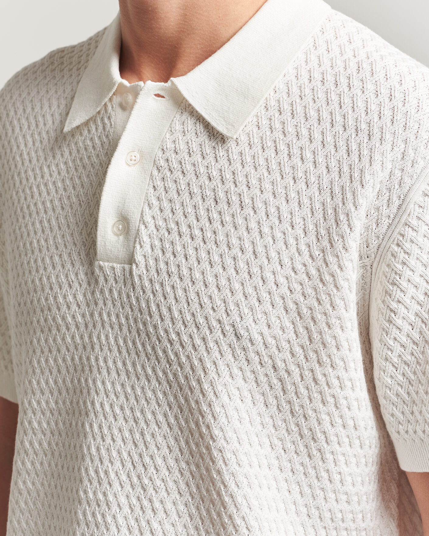 Heren | Polo's | J.Lindeberg | Jacques Structured Knitted Polo Tofu