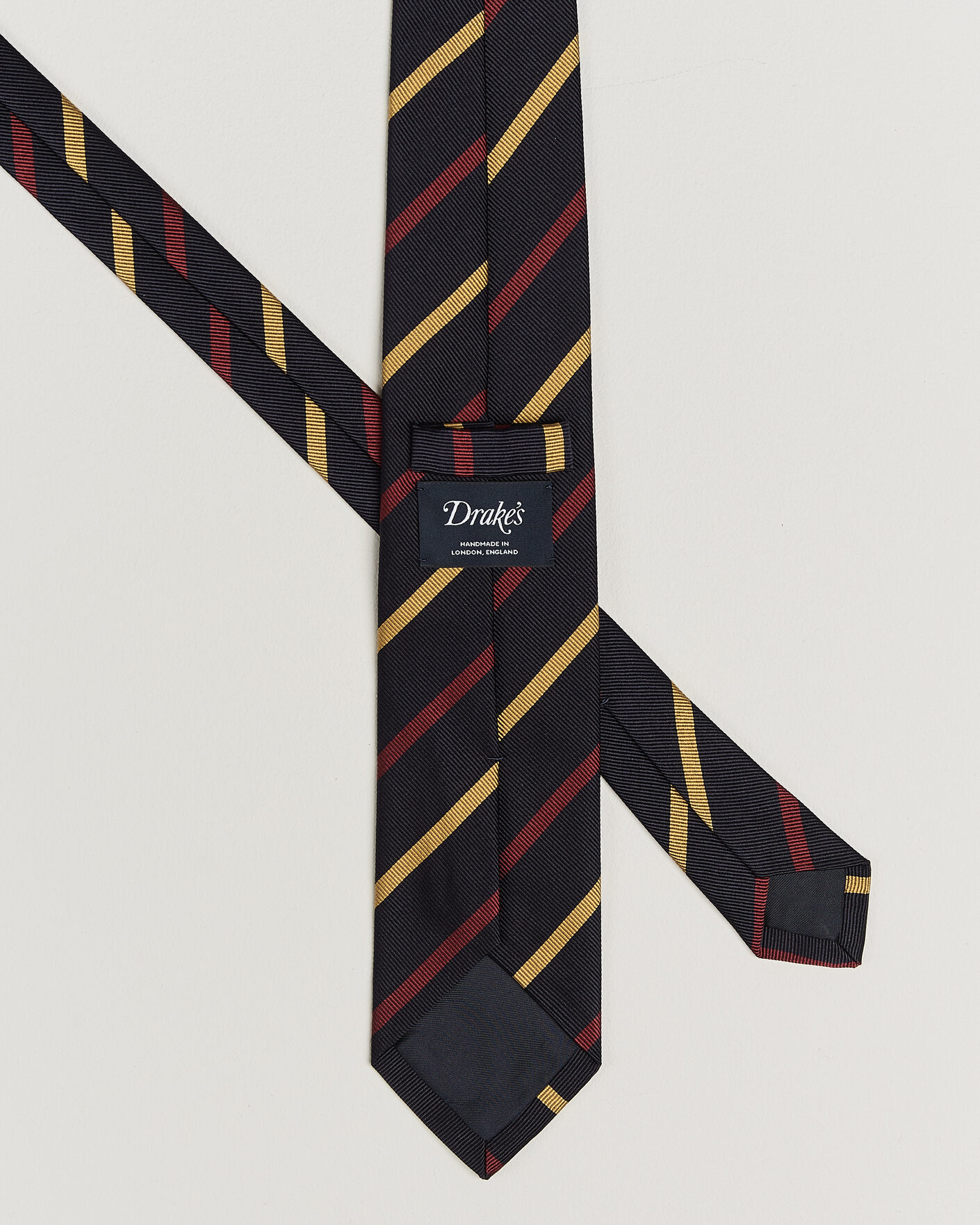 Heren | Stropdassen | Drake's | Line Stripe Super Reppe Tie Navy/Red/Yellow